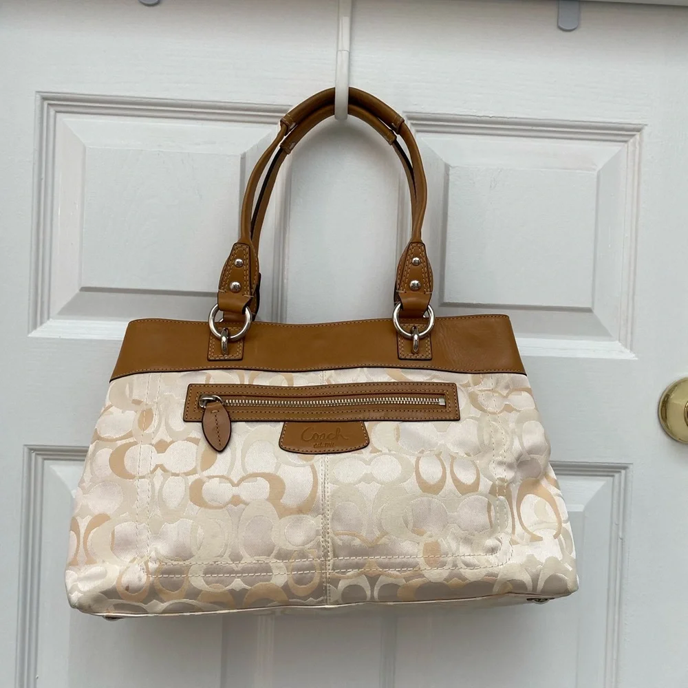 Coach Penelope Signature Shoulder Bag in Brown, Cream. Snap Top Closure.